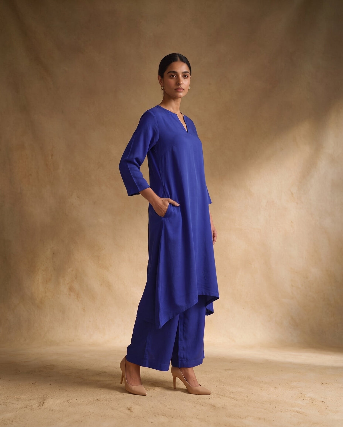Women Royal Blue Cotton Solid V-Neck Asymmetric Kurta Pant Dupatta Set