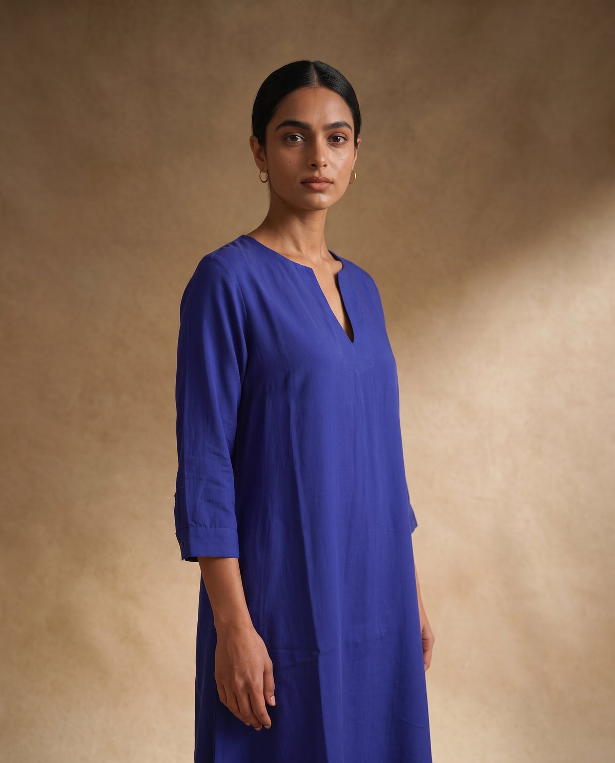 Women Royal Blue Cotton Solid V-Neck Asymmetric Kurta Pant Dupatta Set