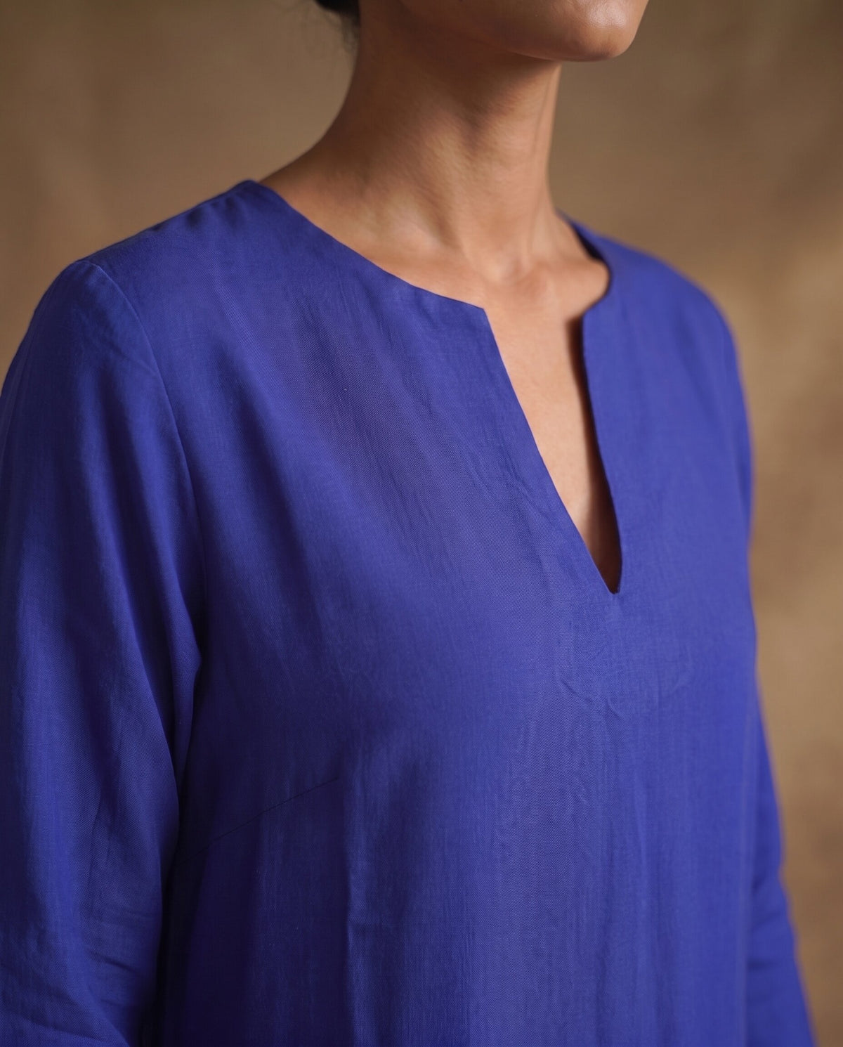 Women Royal Blue Cotton Solid V-Neck Asymmetric Kurta Pant Dupatta Set