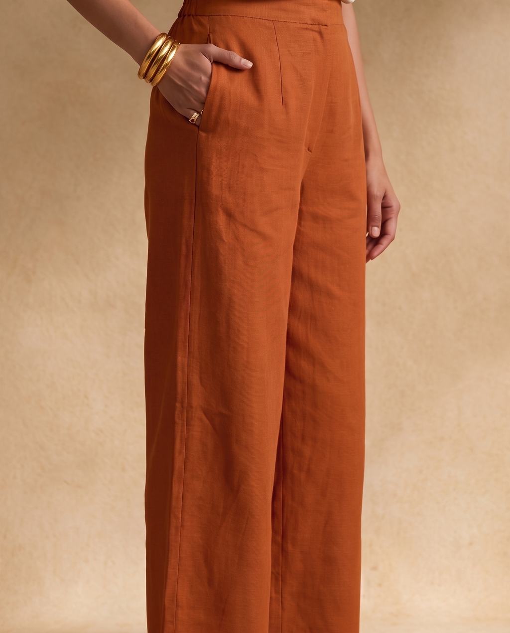 Women Rust Cotton Solid V-Neck Asymmetric Kurta Pant Dupatta Set