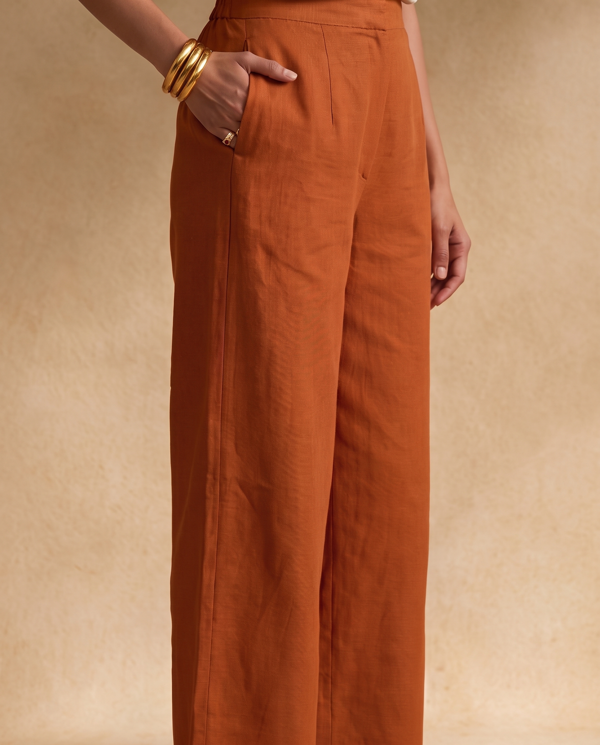Women Rust Cotton Solid V-Neck Asymmetric Kurta Pant Dupatta Set
