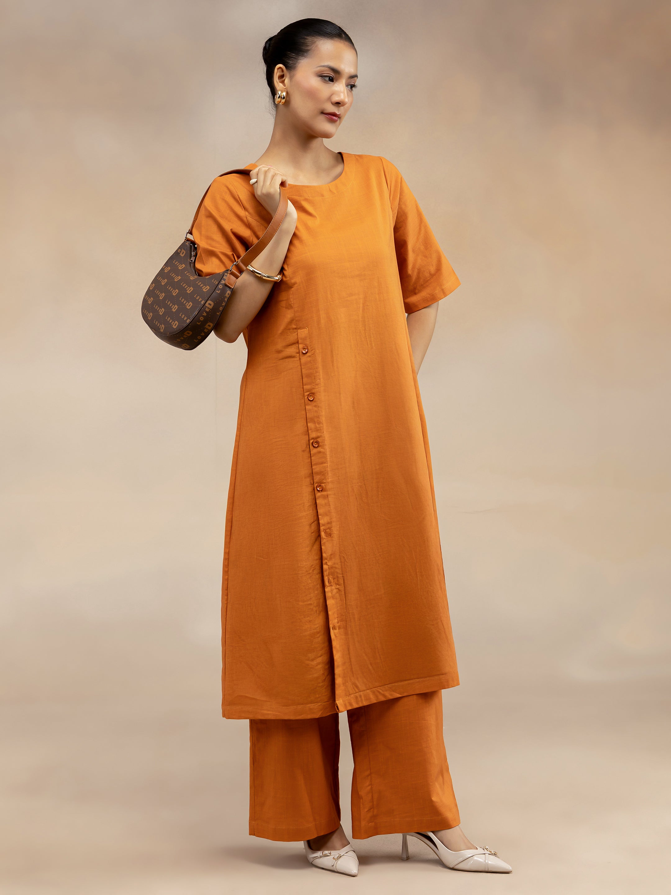 Women Rust Cotton Slub Kurta Set with Off-Centre Button Detail