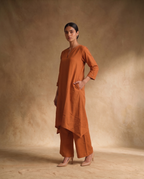 Women Rust Cotton Solid V-Neck Asymmetric Kurta Pant Dupatta Set