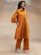 Women Rust Cotton Dobby Textured Kurta with Tassel Detail