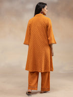 Women Rust Cotton Dobby Textured Kurta Set with Tassel Detail