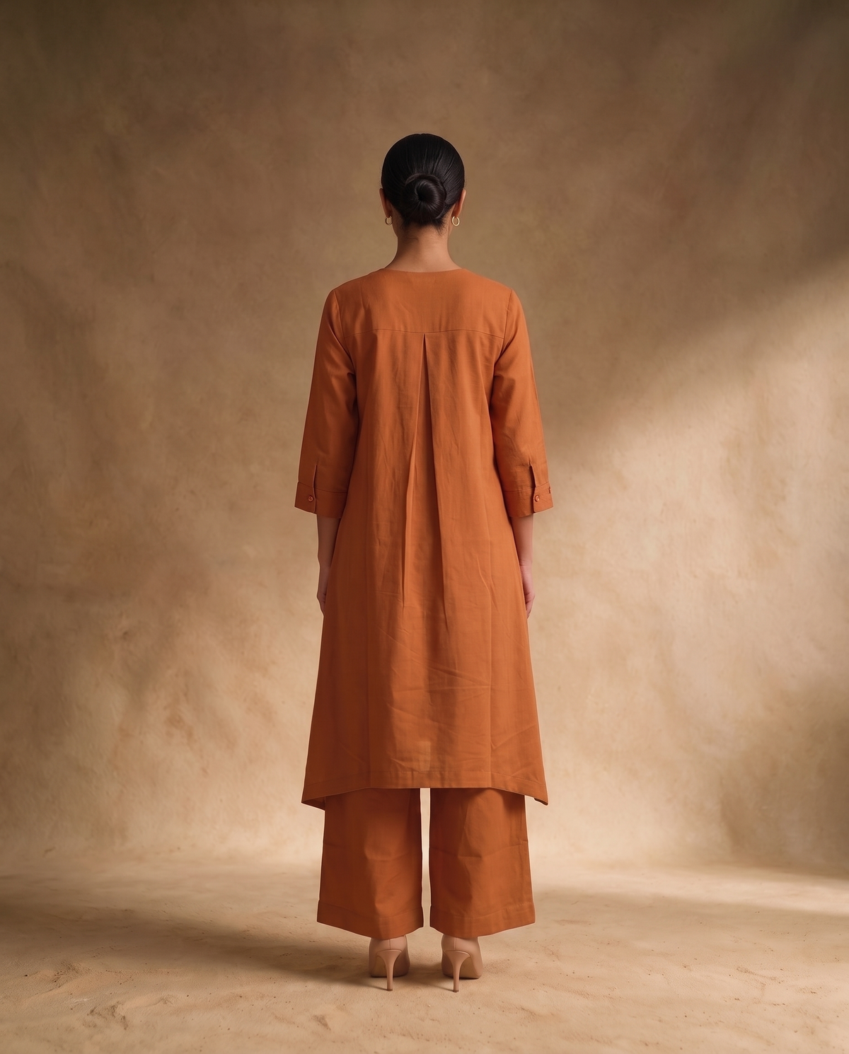 Women Rust Cotton Solid V-Neck Asymmetric Kurta Pant Dupatta Set