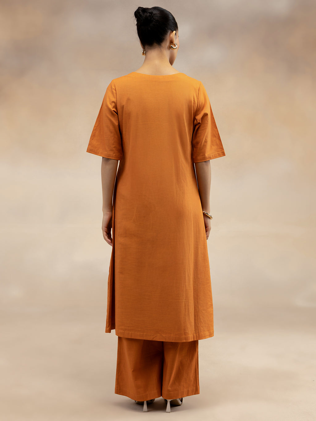 Women Rust Cotton Slub Kurta Set with Off-Centre Button Detail