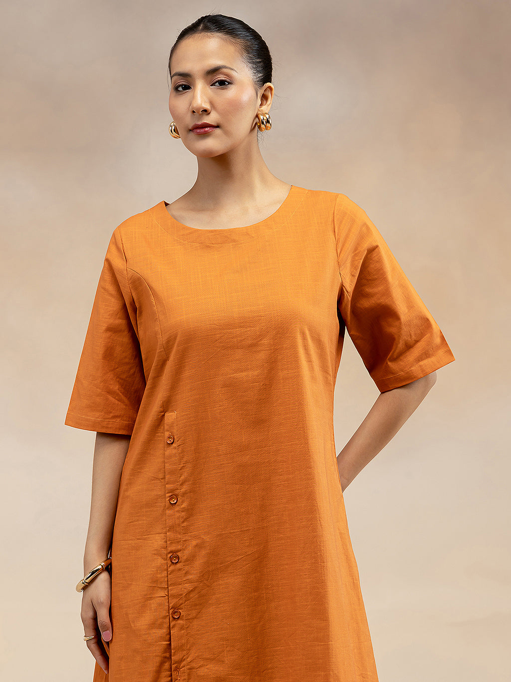Women Rust Cotton Slub Kurta with Off-Centre Button Detail