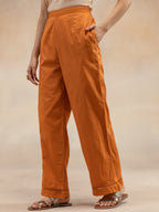 Women Rust Cotton Dobby Textured Kurta Set with Tassel Detail