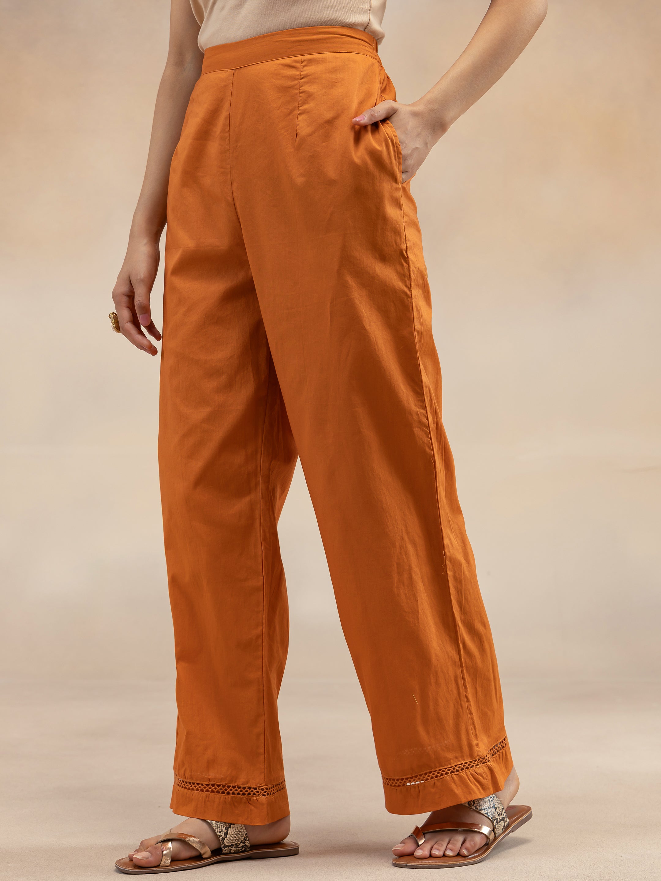 Women Rust Cotton Dobby Textured Kurta Set with Tassel Detail
