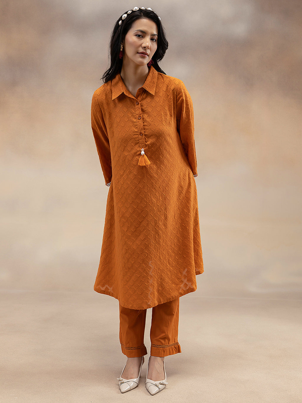 Women Rust Cotton Dobby Textured Kurta with Tassel Detail