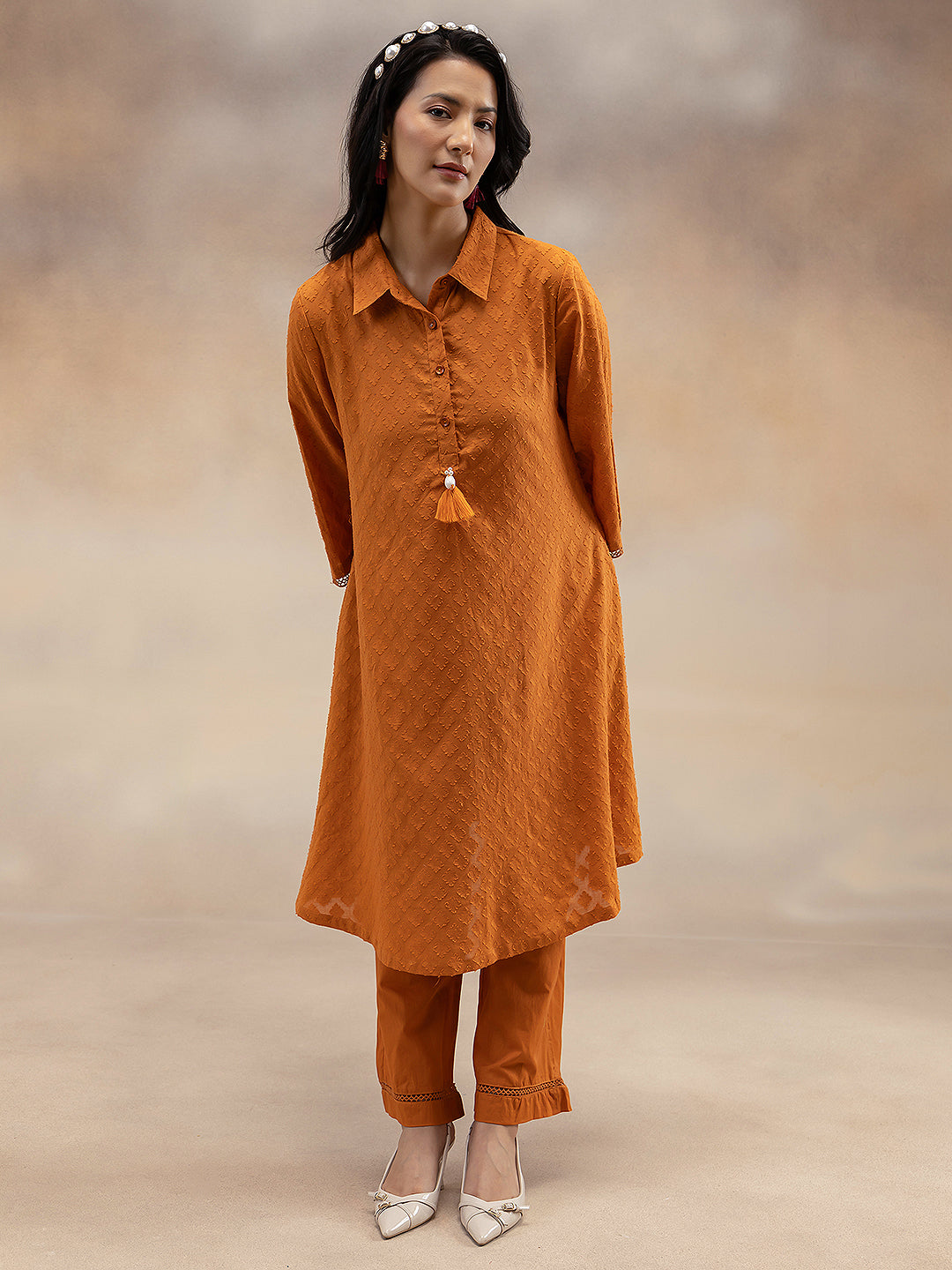 Women Rust Cotton Dobby Textured Kurta with Tassel Detail