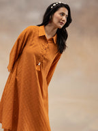 Women Rust Cotton Dobby Textured Kurta Set with Tassel Detail