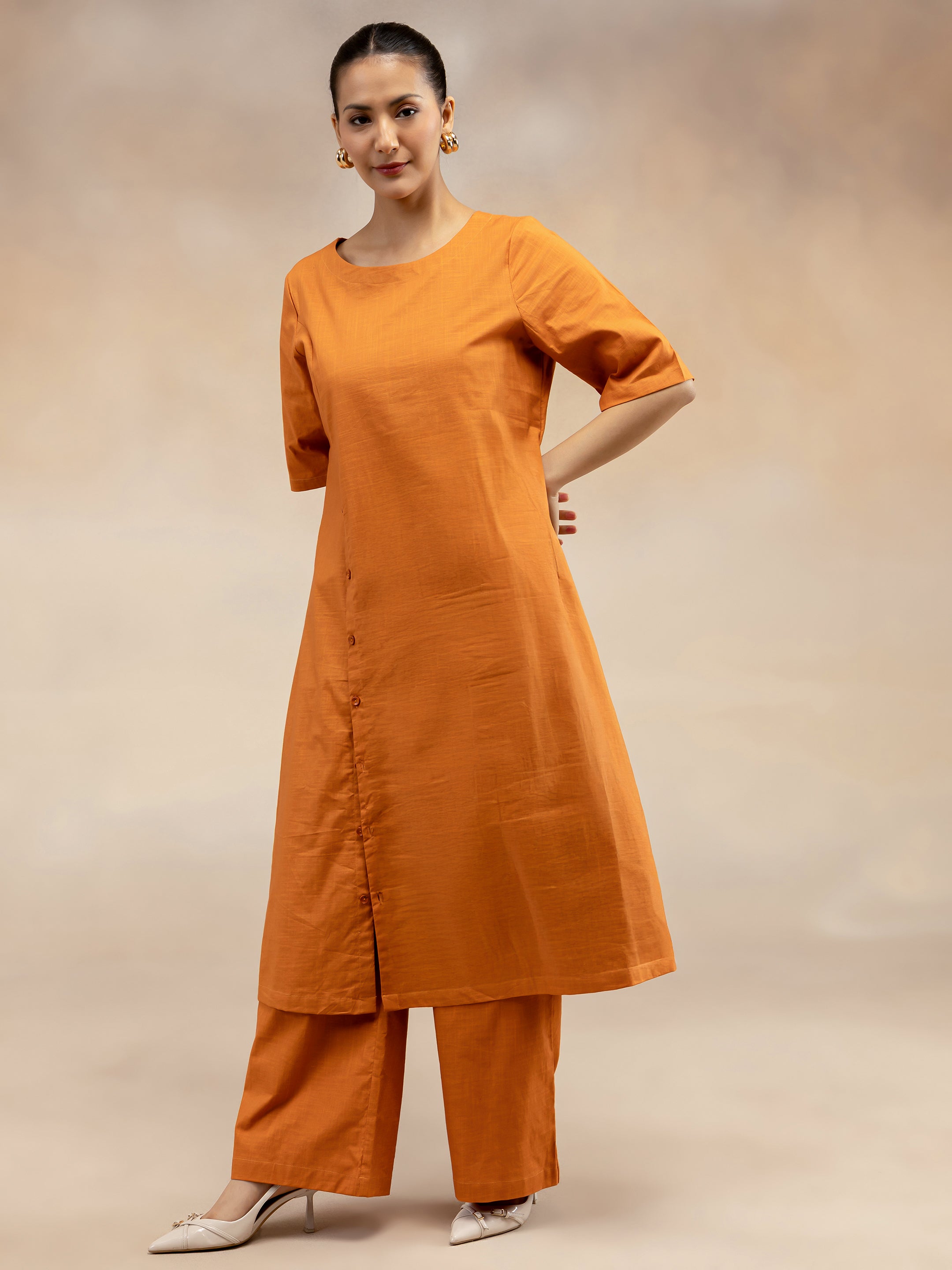 Women Rust Cotton Slub Kurta Set with Off-Centre Button Detail